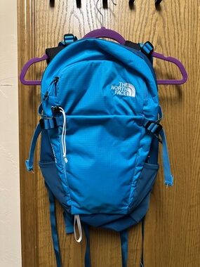 The North Face Teal Basin 24 Backpack with White Stitching